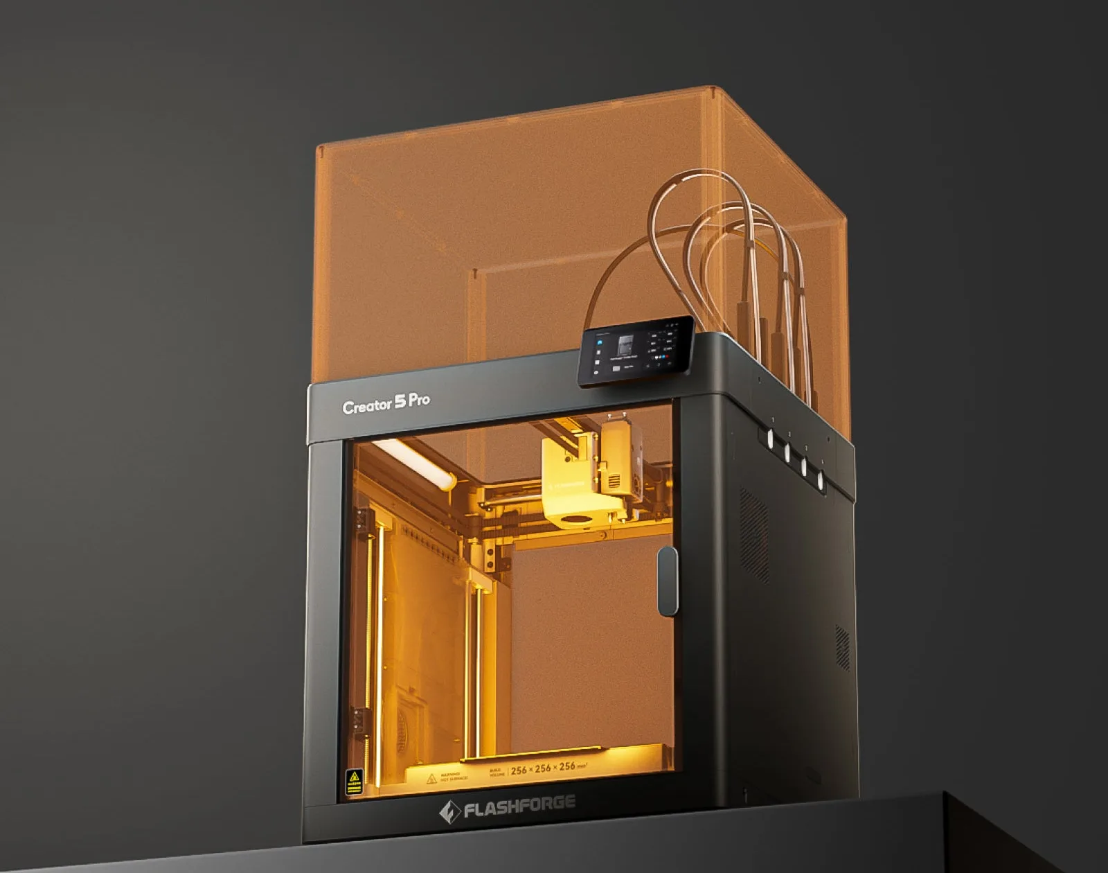 Blick in die orange beleuchtete, aufgeheizte Druckkammer des Creator 5 Pro