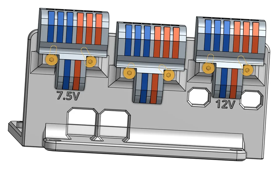 B47 mit drei montierten Hebelklemmen mit blauen und orangen Hebeln, je zwei Schrauben gelb markiert, Beschriftung 7.5V und 12V